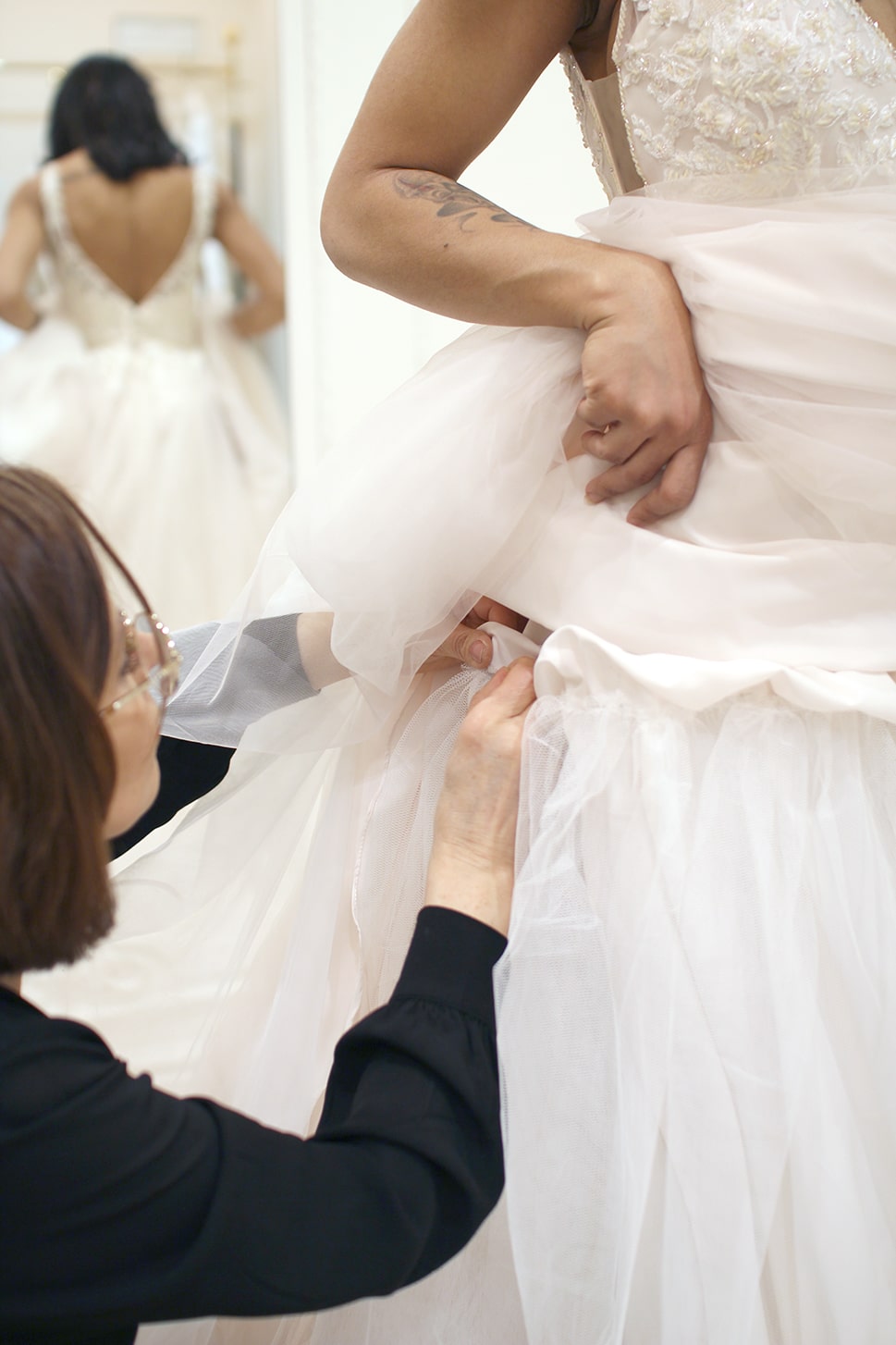 détails retouches robe de mariée paris